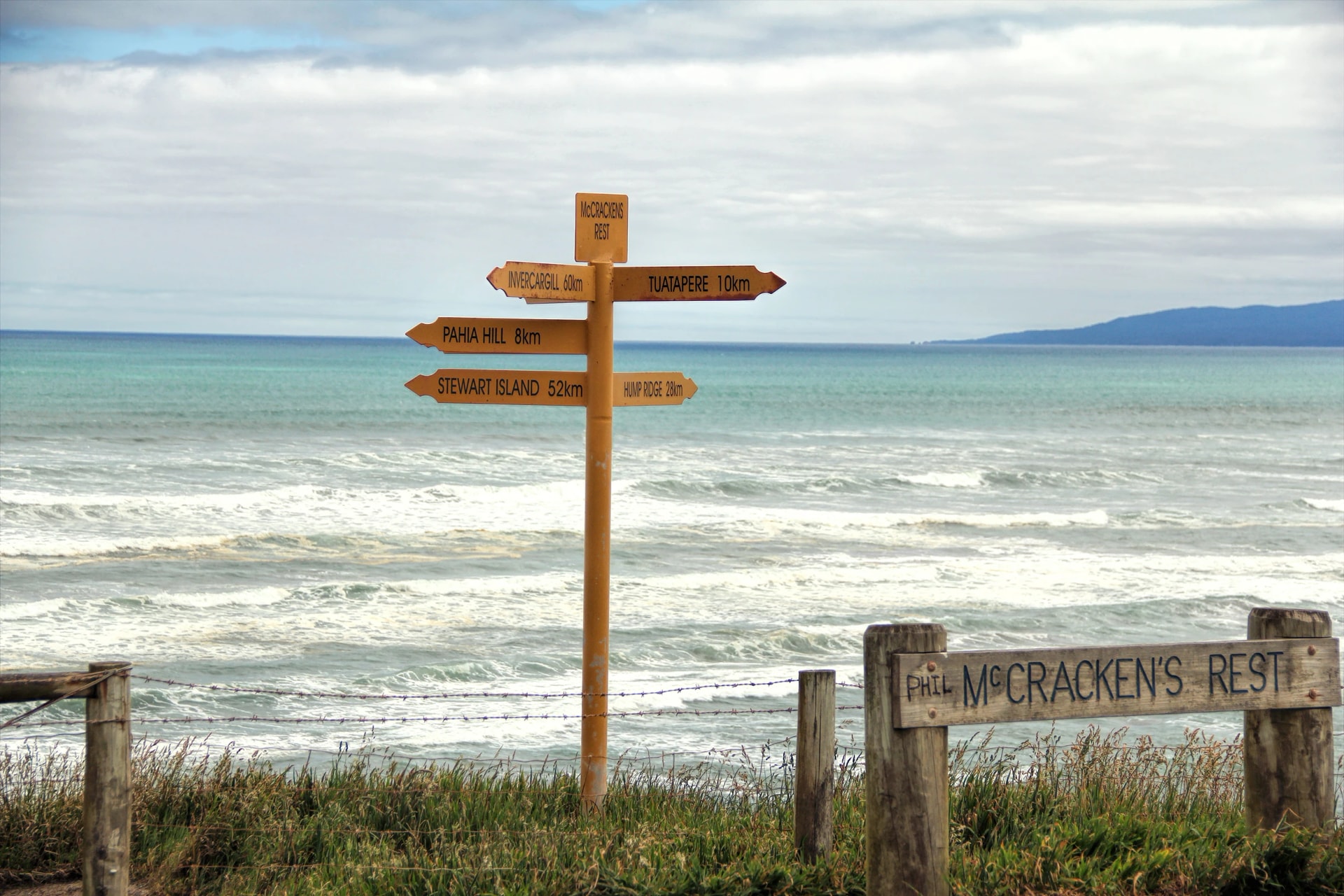 McCracken's Rest signpost above Te Waewae Bay
