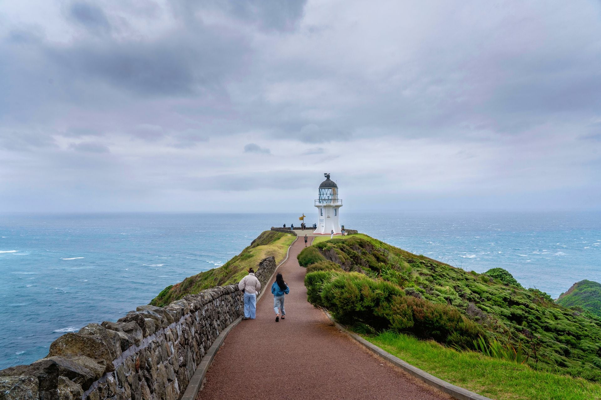 Walk down to the Cape Reinga lighthouse where the two seas meet