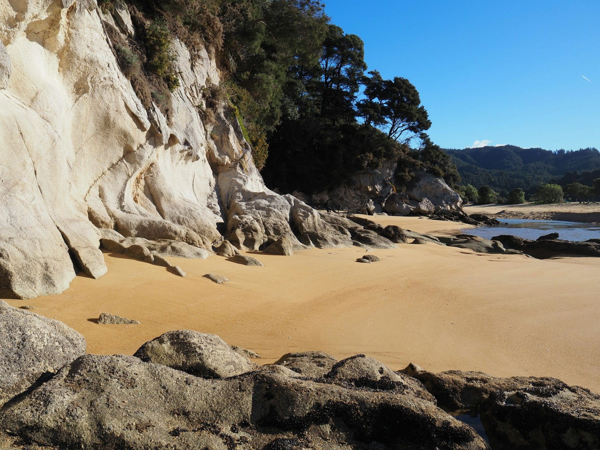Look at the granite, it weathers into the gold sand